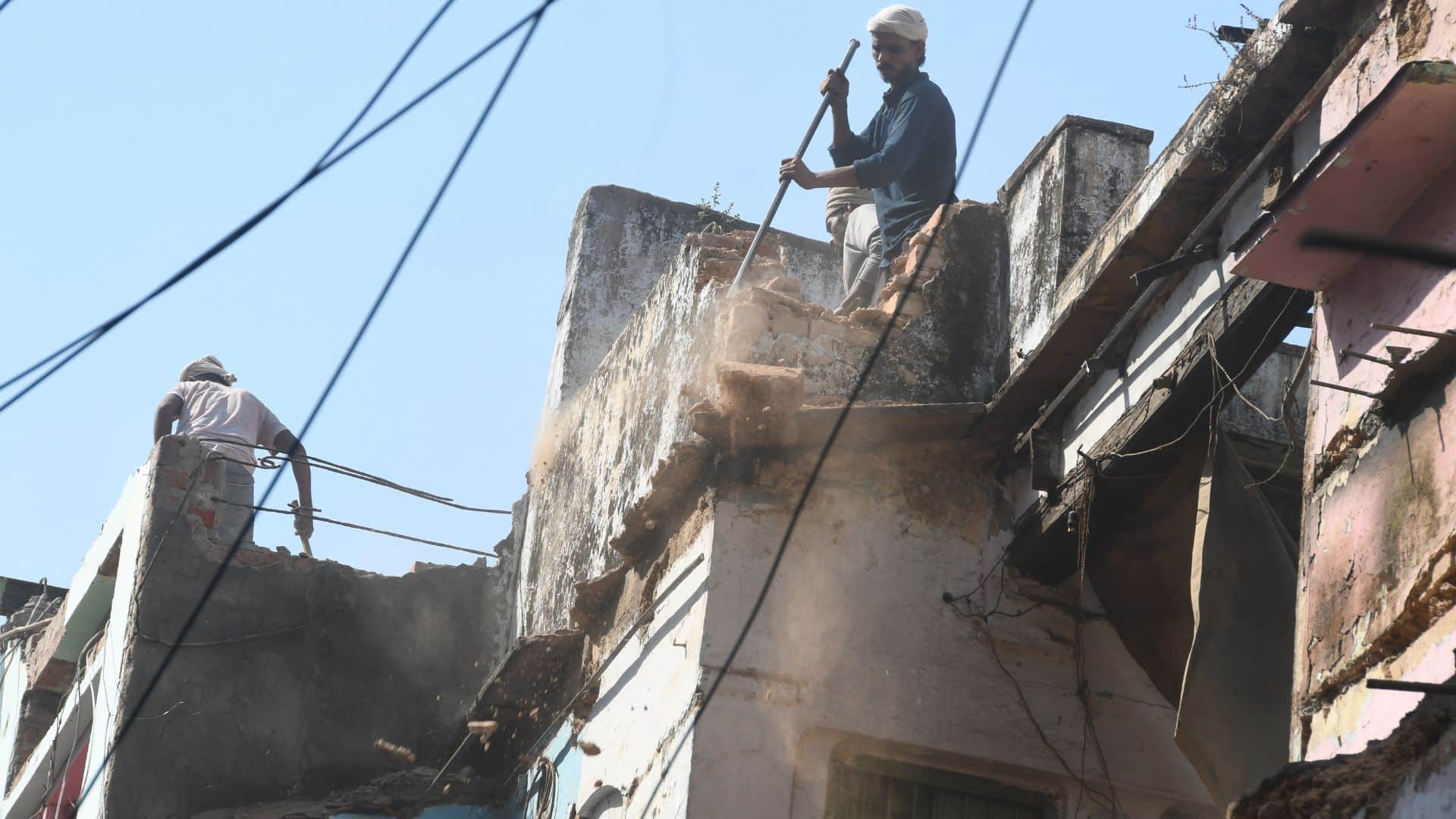 Dal Mandi demolition 15 photos of 14 new buildings bulldozed amid tight security in Varanasi
