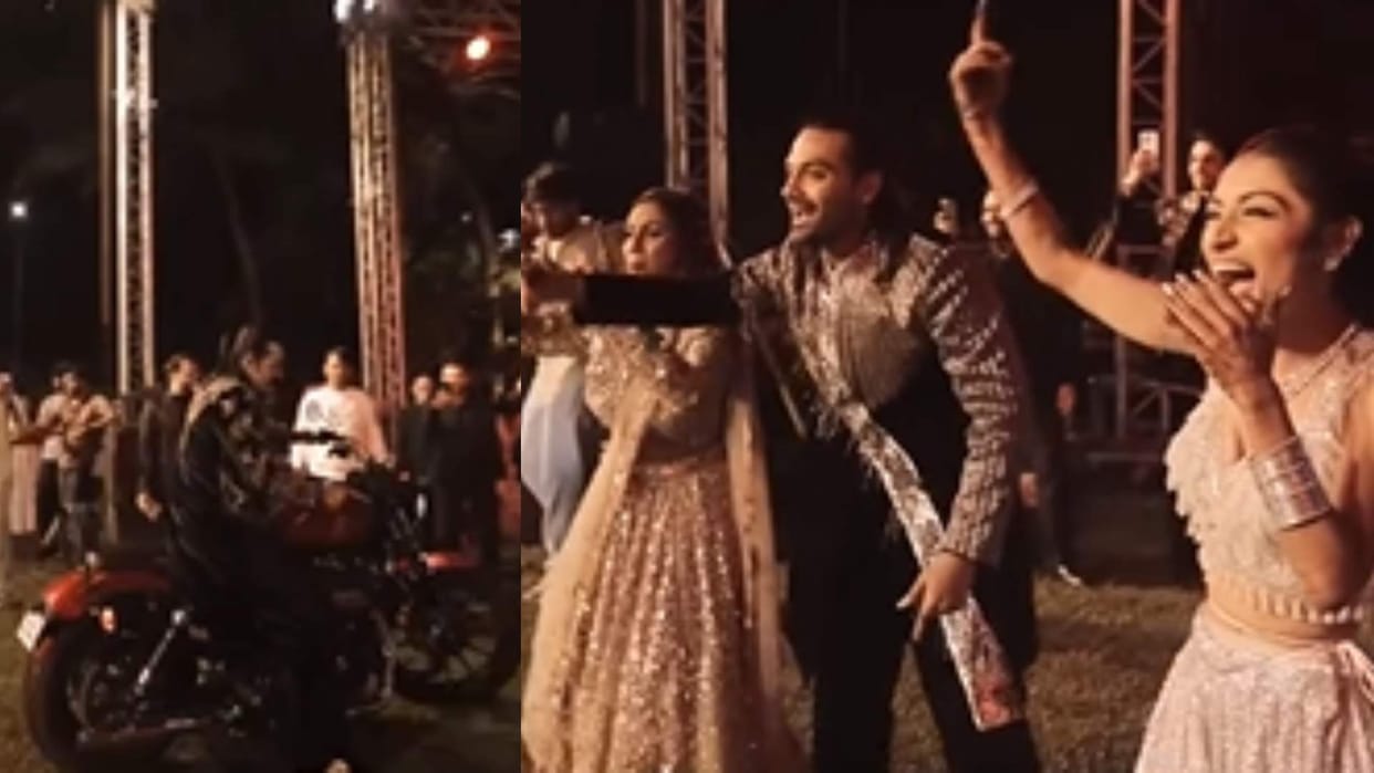 Groom father steals dhurandhar style entry the show with stylish bullet entry at wedding video goes viral