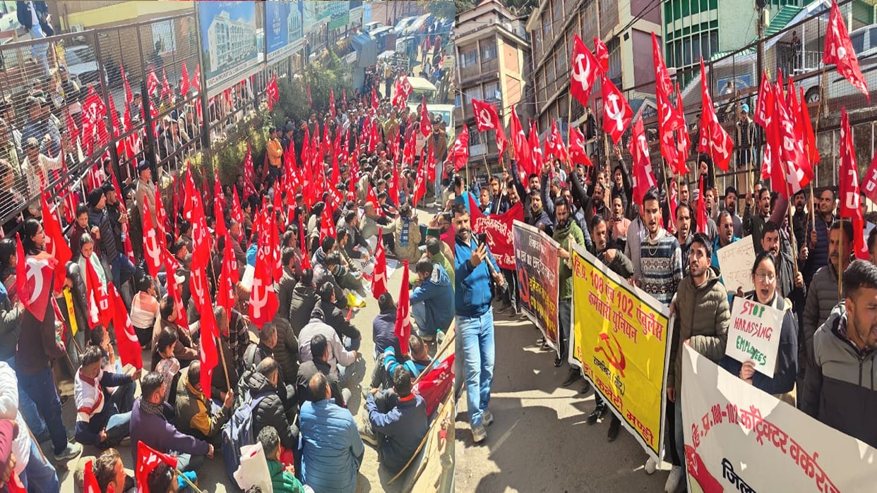 Ambulance workers protested outside the NHM Directorate, raising slogans. Ambulance workers protest