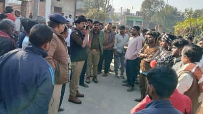 young man was hacked to death with an axe inside his house in Jhunsi, and the accused dumped the body in front