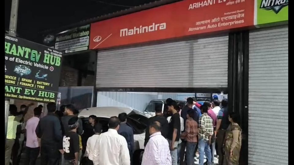 Out-of-Control Car Rams into EV Showroom in Agra Driver Flees Scene