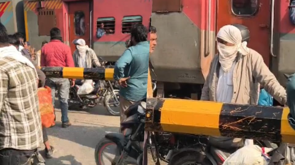 Vehicles passed under the closed gate, Poorabiya Express applied emergency brakes