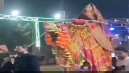 bride entered on a camel for the varmala ceremony