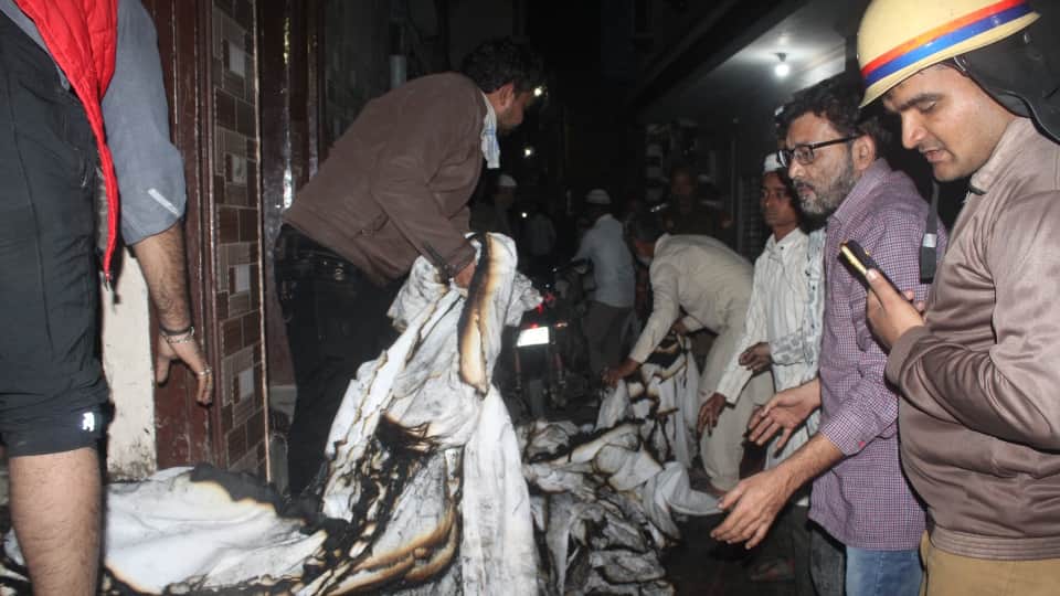 Flames scorched, smoke suffocated Rukhsar was clinging to her twin daughters Six burnt alive in Meerut fire