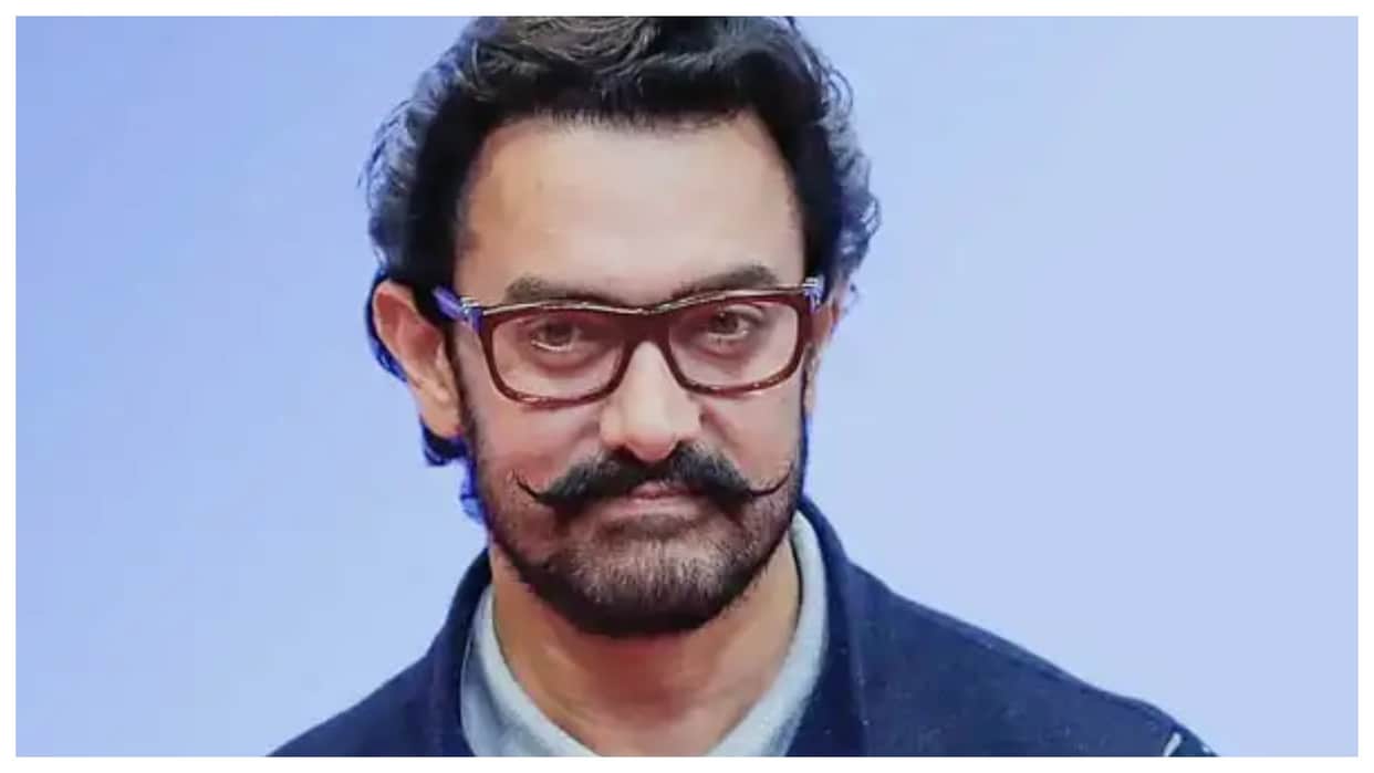Now Why Aamir doesn't refuse to pose for photos? Explain the reason