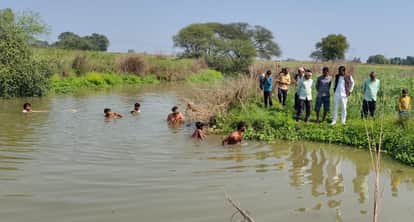 Fatehpur infant boy goes missing while playing outside home villagers fear the worst and enter river continues