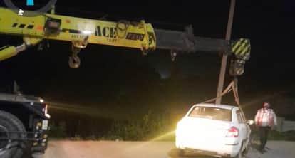 Auraiya Talking on the mobile phone proved costly VDOs car fell into a ditch on the side of the highway