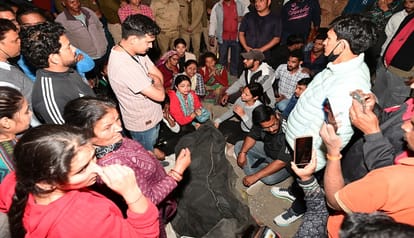 People blocked the road after two women died in a tiger attack