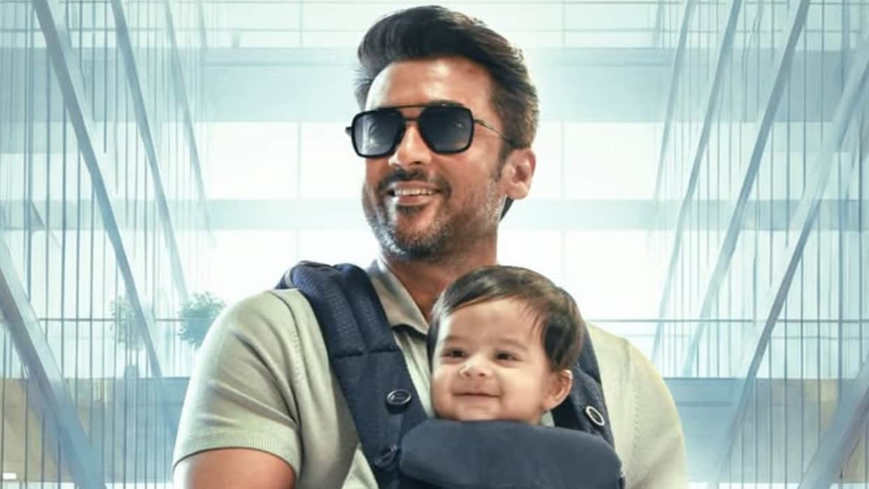 Suriya New Film Vishwanath And Sons Poster Released Actor Seen In A Cool Look Handling A Baby In His Hands