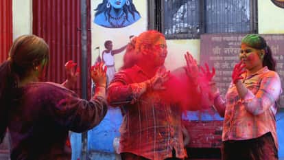 Holi in Kashi celebration of color essence melody Holi is celebrated with Palash flowers at Baba shrine