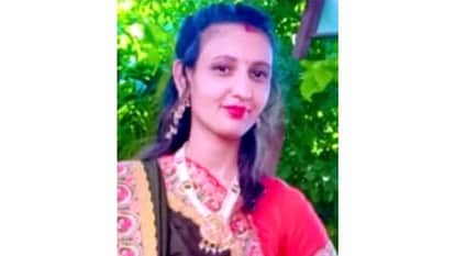 Woman body found hanging, murder charge