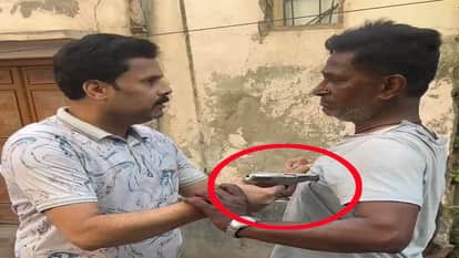 BJP leader points pistol at neighbour chest