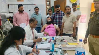 Ashutosh Brahmachari undergoes medical examination at Colvin Hospital after being attacked on a moving train,