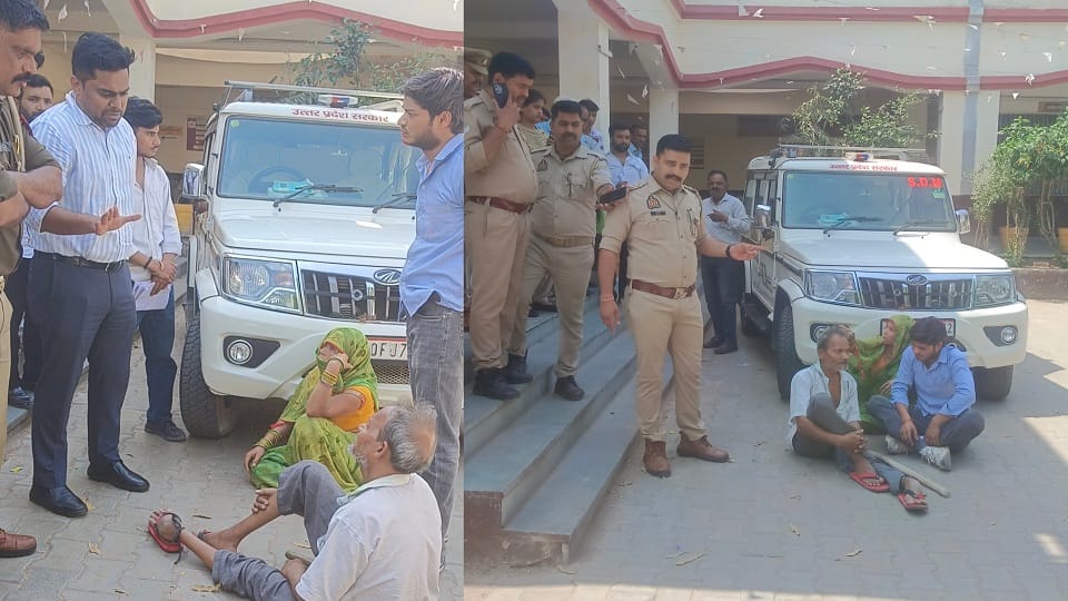 family lay down in front of SDM car due to lack of action on complaint of illegal occupation