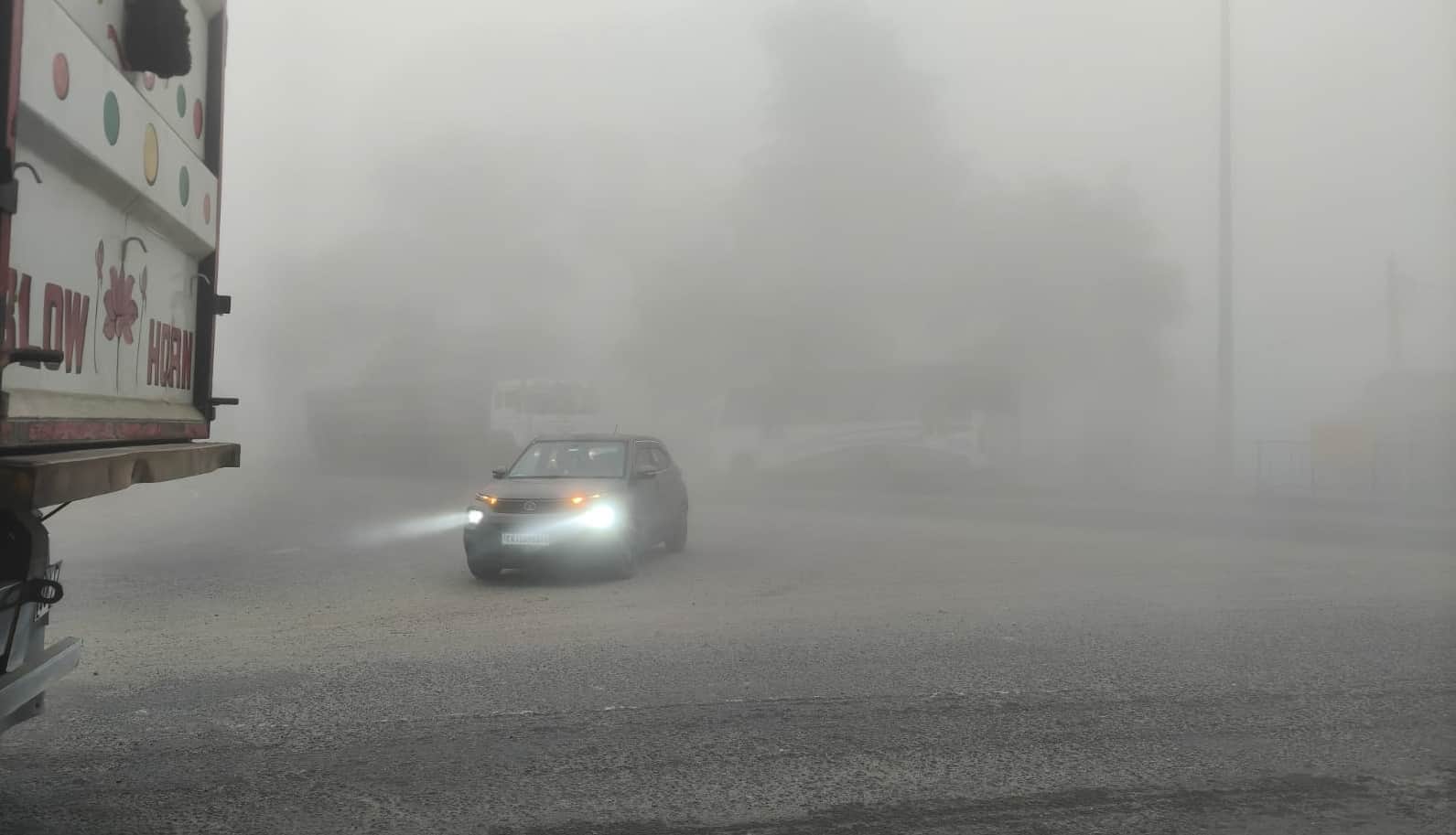 UP Weather Update Several districts are enveloped in a blanket of fog with zero visibility slowing down speeds