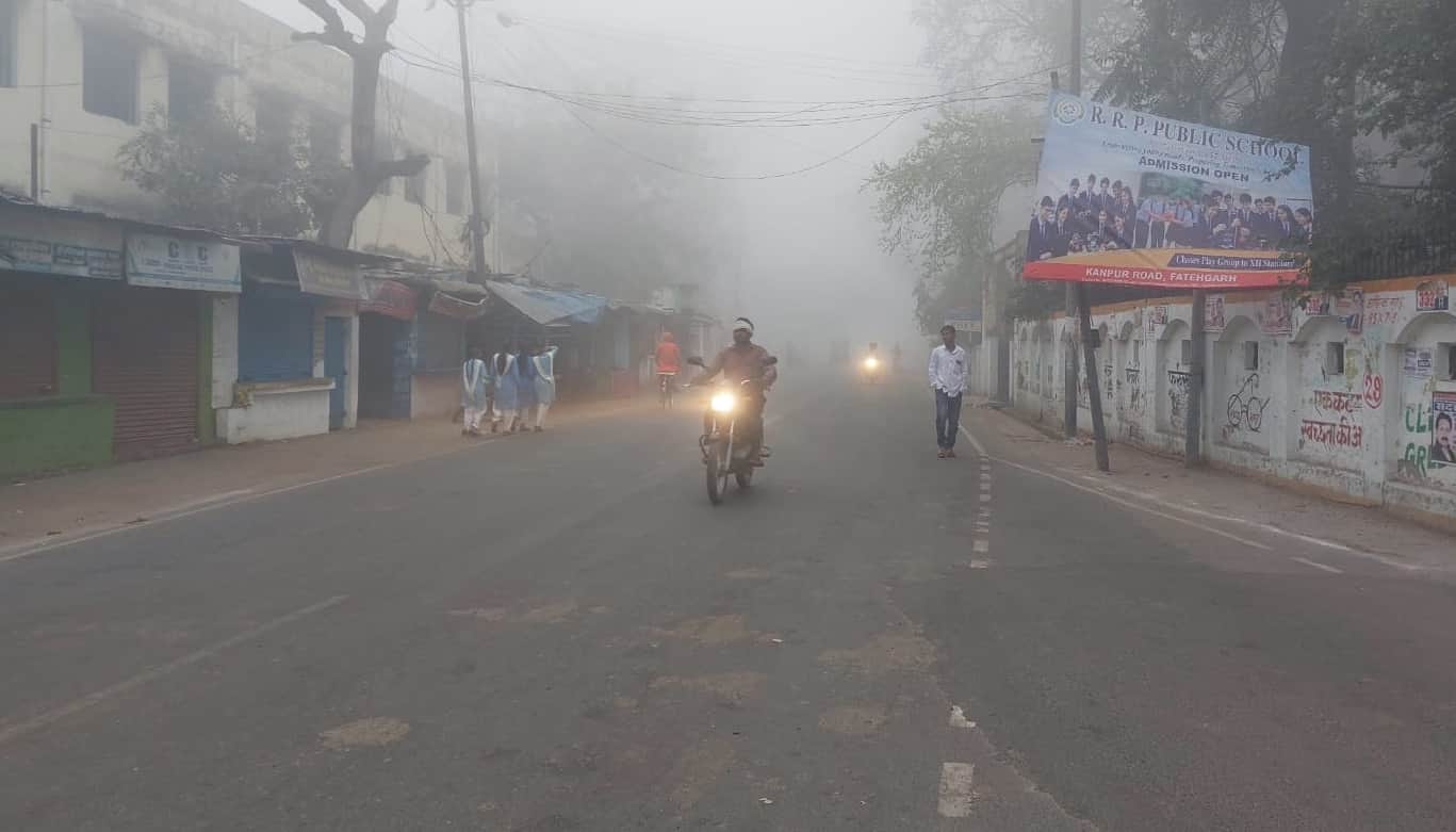 UP Weather Update Several districts are enveloped in a blanket of fog with zero visibility slowing down speeds
