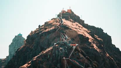 gujarat girnar ambaji temple 11 priests removed after alleged non veg party video