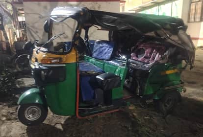 A tempo collided with a truck killing two people and injuring a woman.