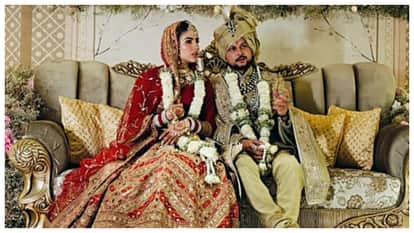 Newly-married couple Indian cricket team spinner Kuldeep Yadav and his wife Vanshika seen in Dehradun airport