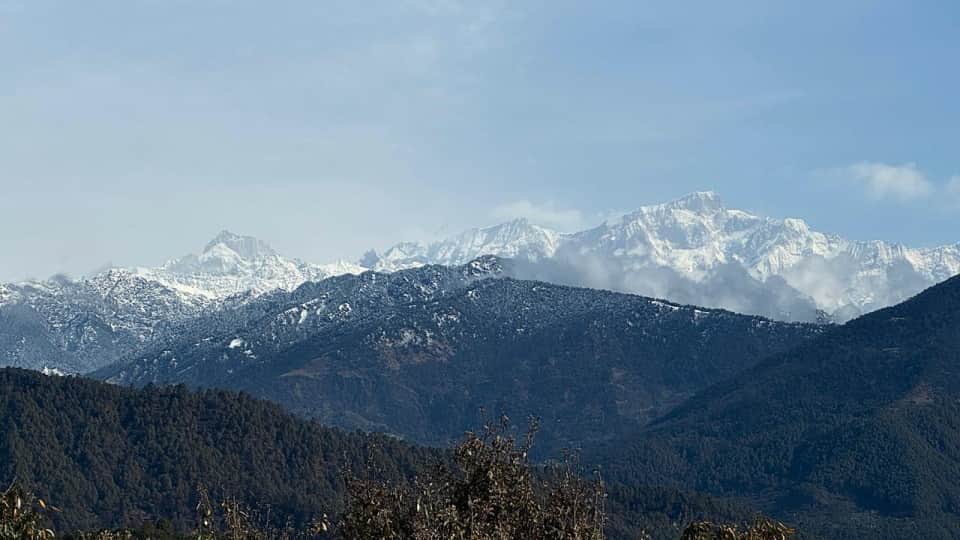 Uttarakhand Weather Snowfall on Peaks from Auli to Badrinath Turn White with Snow Tourist Spots Bustle Photos