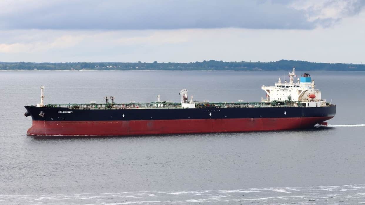 Tanker set ablaze after being struck by projectile in the Strait of Hormuz off the coast of Oman
