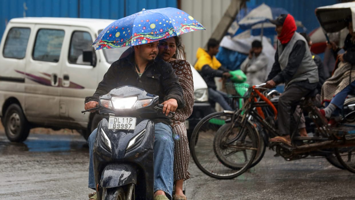 Weather Updates Western disturbance active amid rising heat rain storms temperature fluctuations IMD Alert