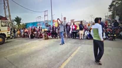 People blocked the road after not getting gas cylinders