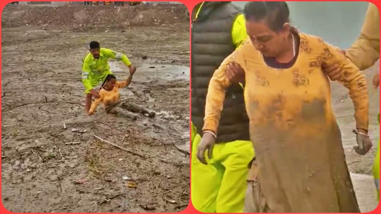 दलदल में फंसी महिला को रेस्क्यू करते हुए।