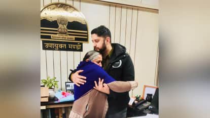 An Emotional Scene at the Mandi: Elderly Mother Embraces DC in Memory of Her Son