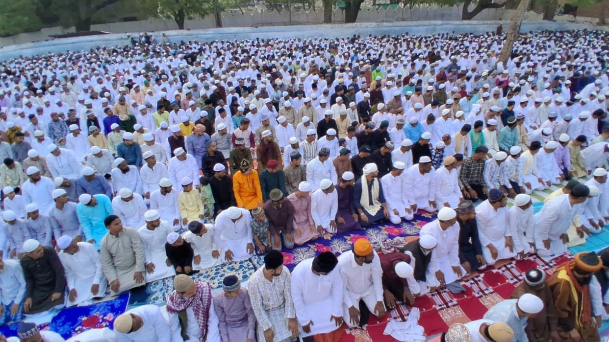 Eid prayers offered with deep reverence people embraced one another to exchange Eid greetings in mirzapur