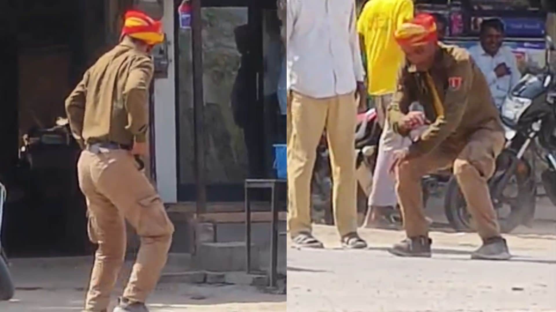 पुलिस की वर्दी पहन नाचता युवक