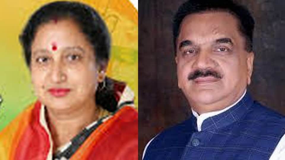 पूर्व विधायक राजकुमार ठुकराल और मीना शर्मा