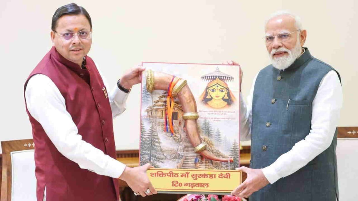 CM Dhami Meets PM Modi Presents Replica of Goddess Surkanda Devi and Badrinath Cow Ghee Uttarakhand news