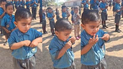School assembly little boy eating lollipop during prayer viral video winning hearts on internet
