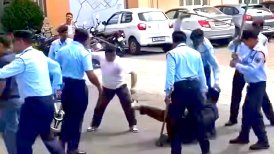 Jollygrant Guard at a private institution brutally beat  young man with sticks  they showed no merc