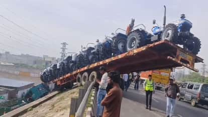 Trolley Loaded with Tractors Left Dangling from Highway Bridge in Mathura