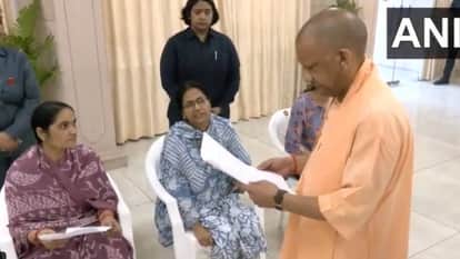 CM Yogi listened to people grievances said Do not panic ensure that every problem is resolved