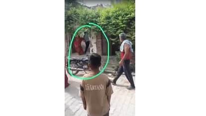 A woman was attacked with lethal weapons over a house dispute