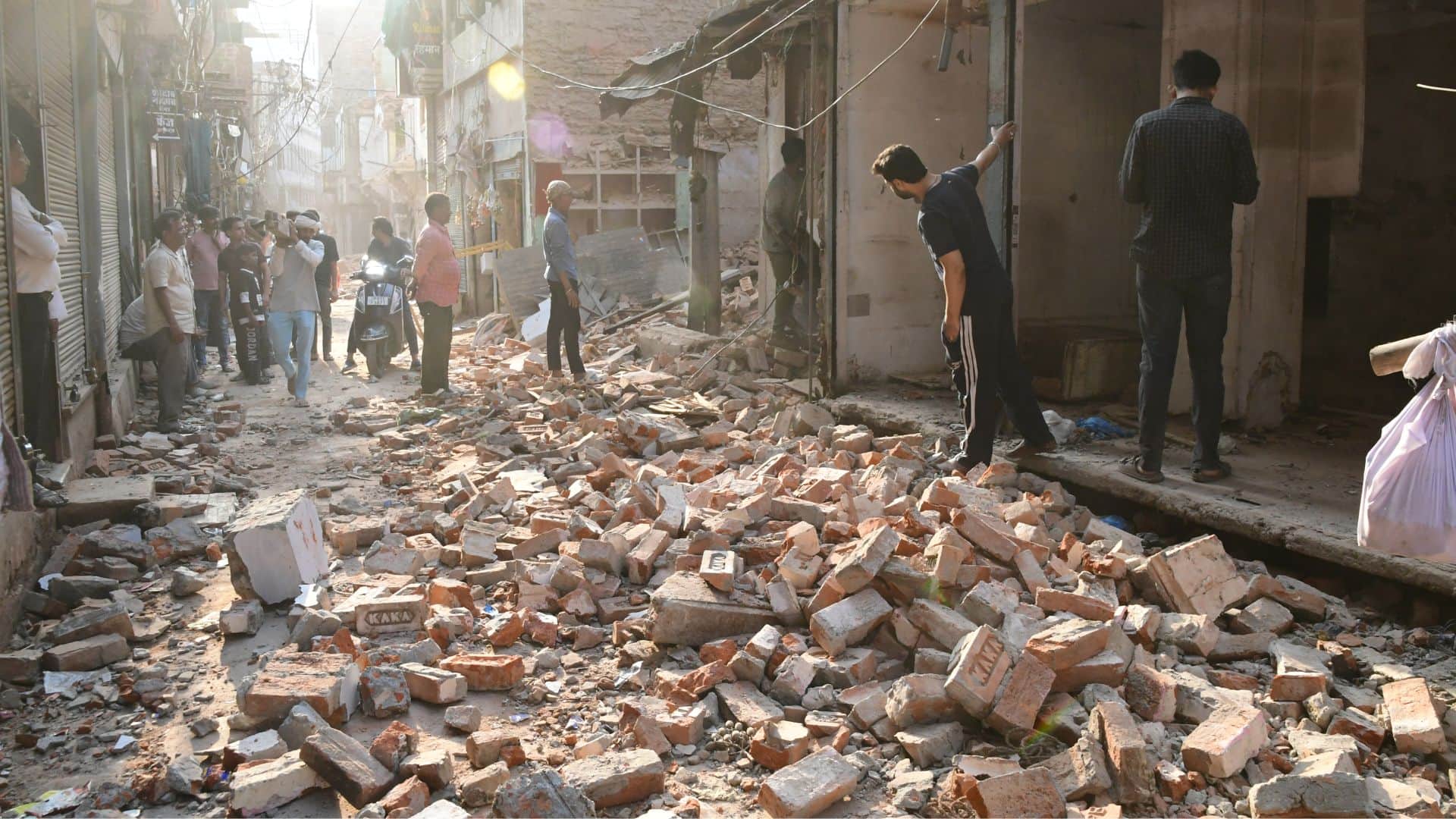Buildings in Dal Mandi demolished using bulldozers chisels and hammers in varanasi