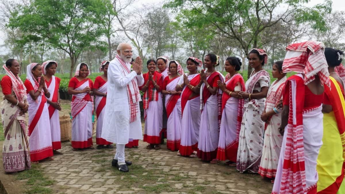 PM Modi Plucks Tea Leaves and Enjoys Jhumur Dance Highlights from Assam Visit in photos