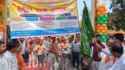 Children read newspapers in schools during the new academic session