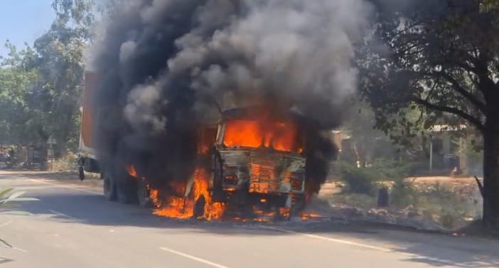 Unnao Container engulfed in flames on highway driver saves life by jumping out fire tenders under control