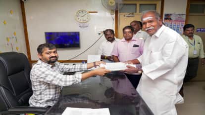 CM Rangasamy is seen in the fray with a calm demeanor and confidence, contesting from two seats