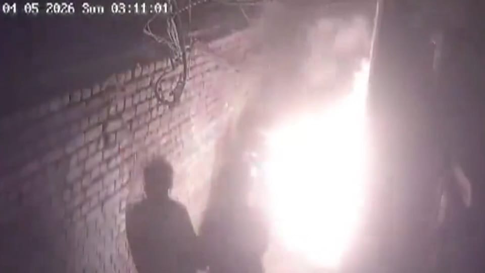 Youths set fire outside a house in Adarsh Nagar; incident captured on CCTV
