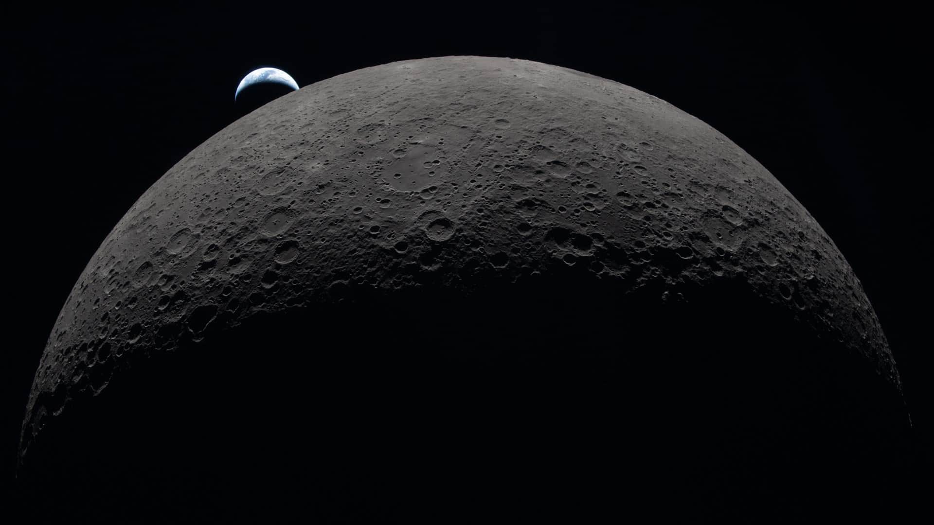 nasa artemis 2 mission captures moon far side orion video lunar surface footage