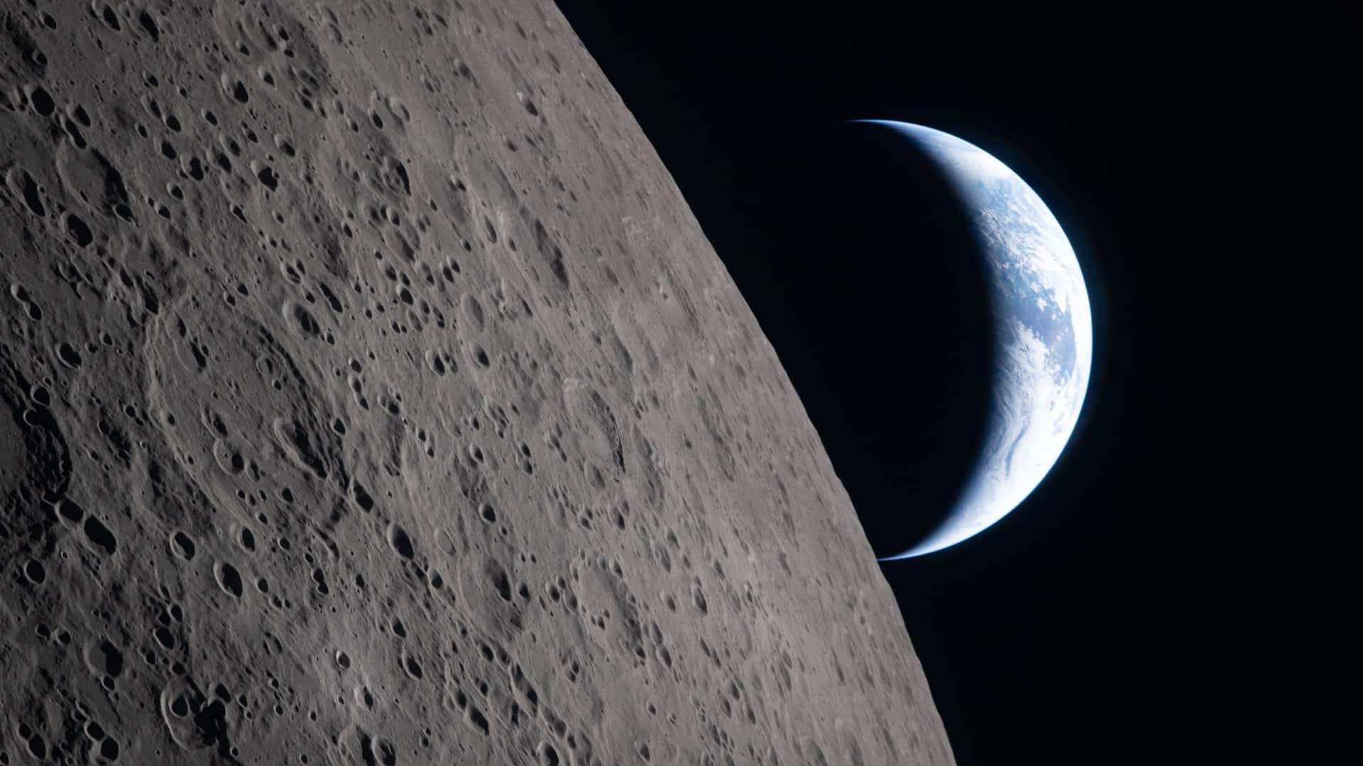 nasa artemis 2 mission captures moon far side orion video lunar surface footage