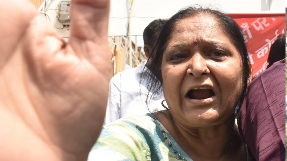 Meerut Central Market seal woman kept pleading with folded hands officers Panic Erupts as Merchant Collapses