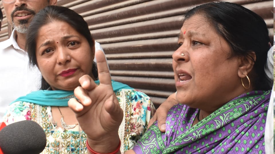 Meerut Central Market seal woman kept pleading with folded hands officers Panic Erupts as Merchant Collapses