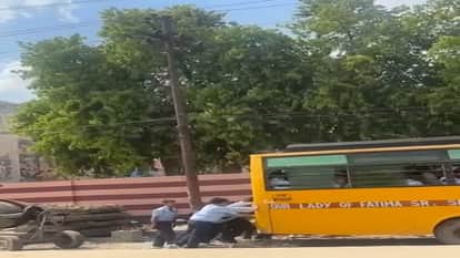 School bus pushed by children