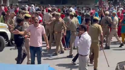 Protesters and police clash over pay hike in Noida